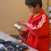 Photo of student building a robot