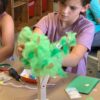 Photo of student building a robot