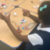 Photo of student building a robot