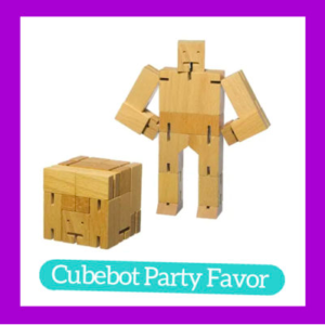 Photograph of Cubebot toy. On the left is a picture of the toy folded into a cube, on the right is the toy in the formation of a robot. On the bottom is a turquoise pill shaped bar with white lettering "Cubebot Party Favor". A purple square outline frames all of it.
