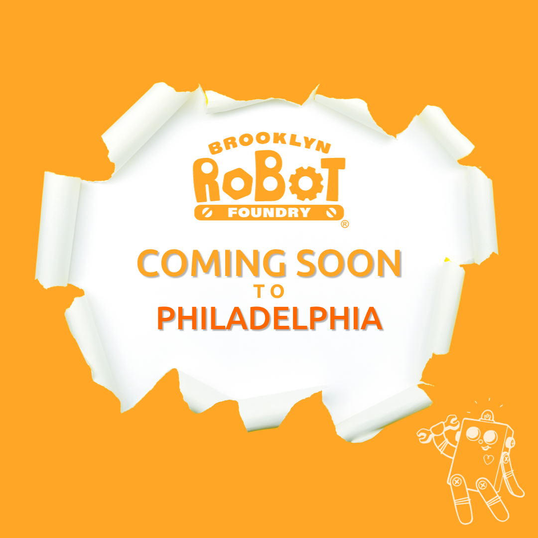 Illustration that resembles a break in an orange wall with a Brooklyn Robot Foundry logo and the text: Coming Soon to Philadelphia