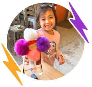 girl building robot at brooklyn robot foundry
